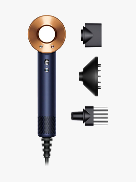 Dyson Supersonic Hair Dryer in branded component with attachments on a light gray background