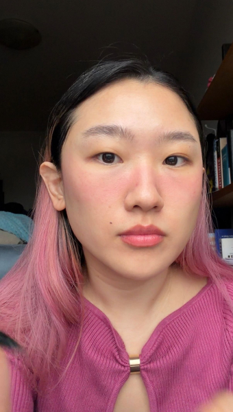 A selfie of Allure commerce editor Sarah Han before applying the Benefit Cosmetics Mighty Fine Brow Pen