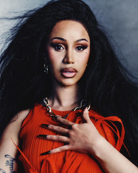 Portrait of Cardi B wearing red top